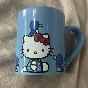 Blue glittery Hello Kitty bird mug